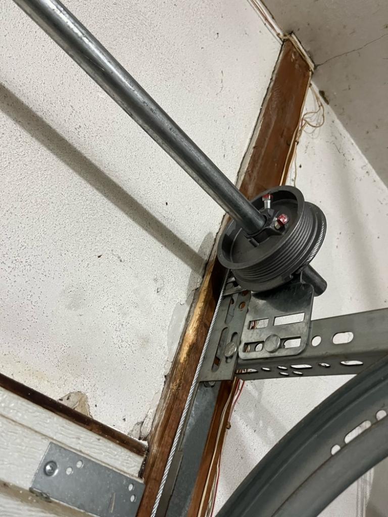 garage door spring replacement broken torsion spring Garage Door Maintenance garage door repair Garage Door Spring Installation Garage Door Maintenance Moline IL