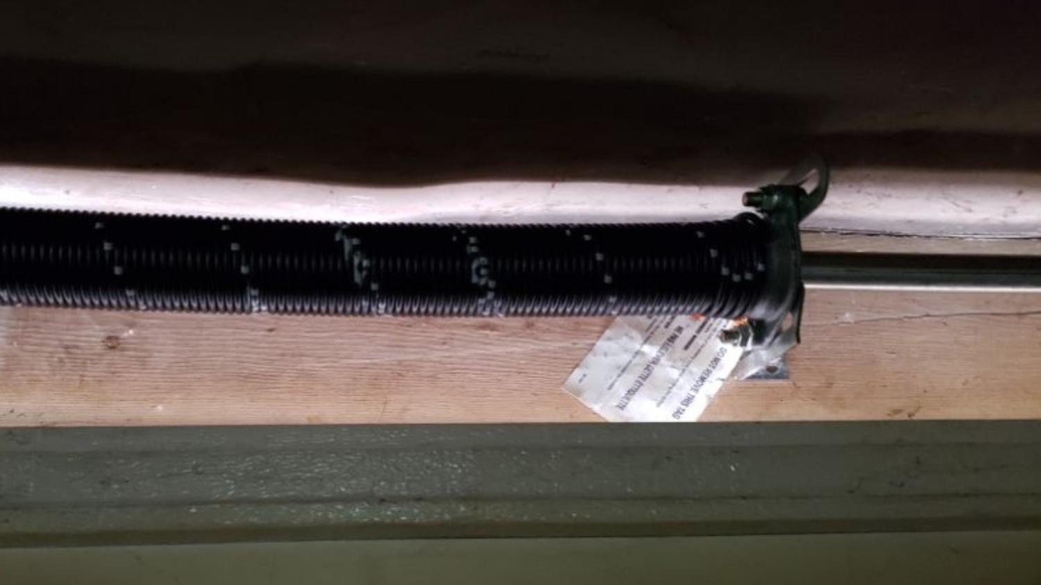 garage door repair garage door service garage door spring replacement broken torsion spring Garage Door Maintenance Residential Garage Door Spring Replacement Bettendorf