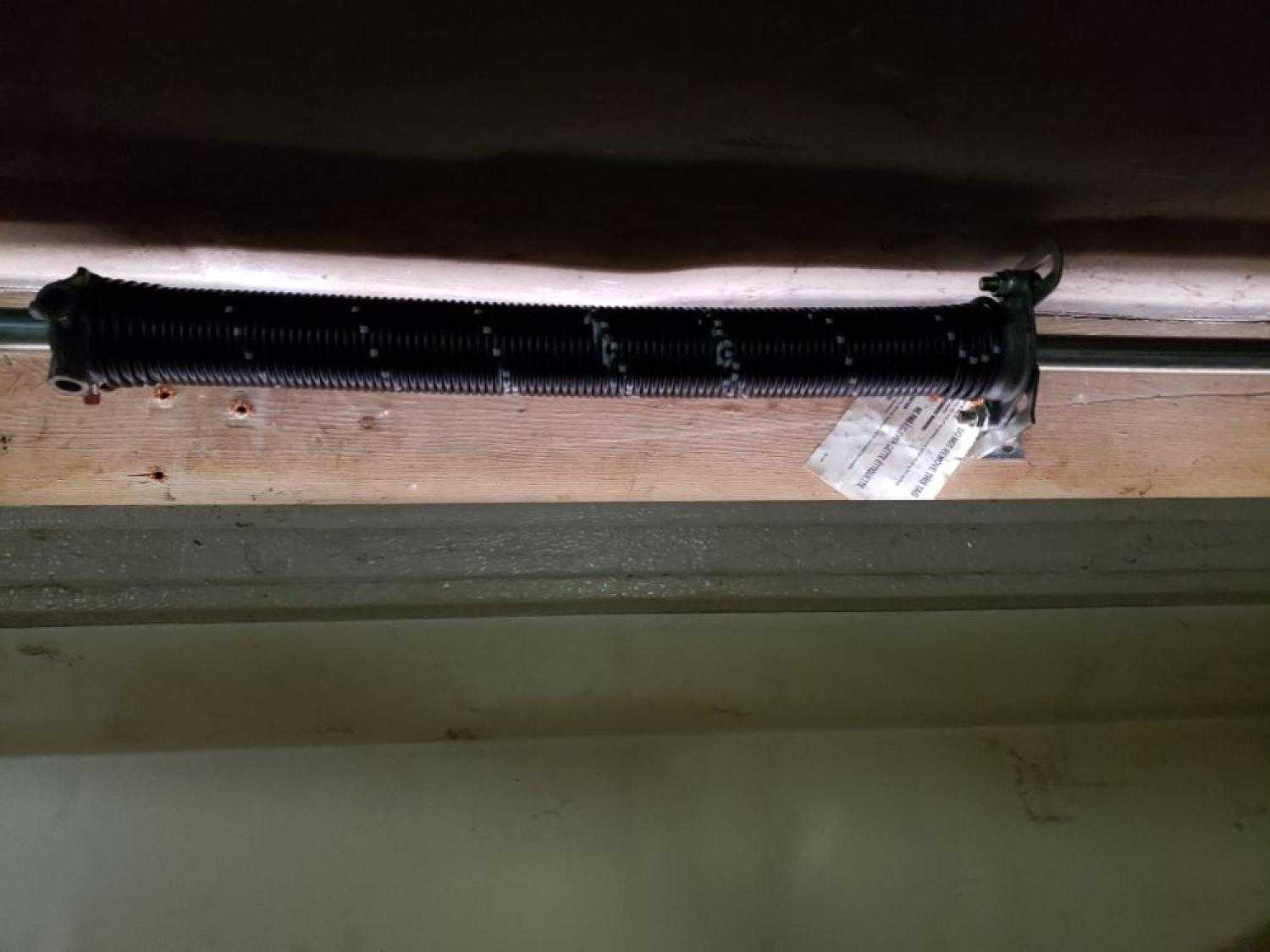 Garage Door Maintenance garage door repair garage door service garage door spring replacement broken torsion spring Residential Garage Door Spring Replacement Bettendorf