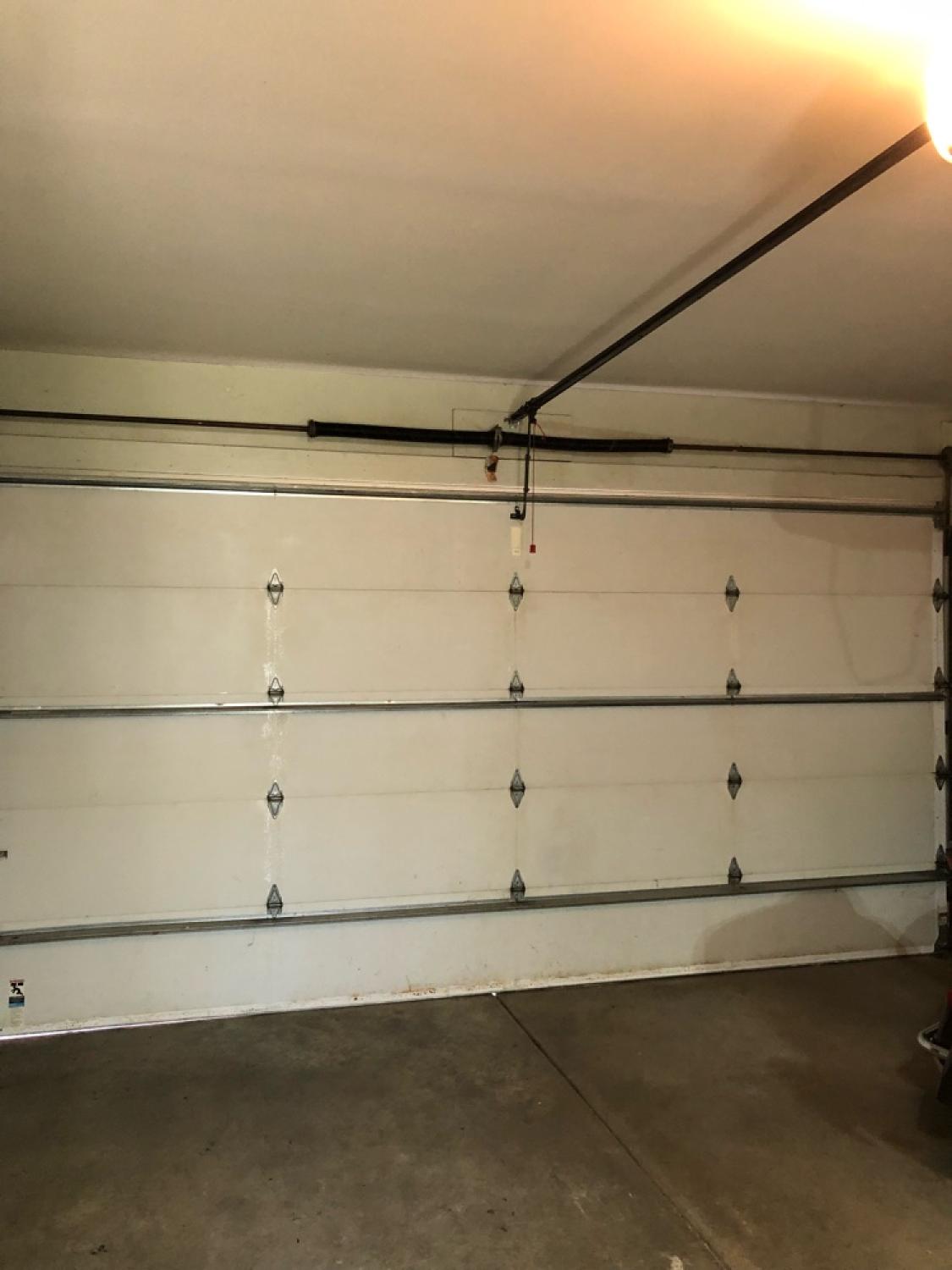 broken torsion spring garage door spring repair garage door spring replacement garage door torsion spring near me residential garage door spring replacement Residential Garage Door Spring Replacement Moline, IL